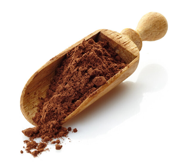 wooden scoop with cocoa powder