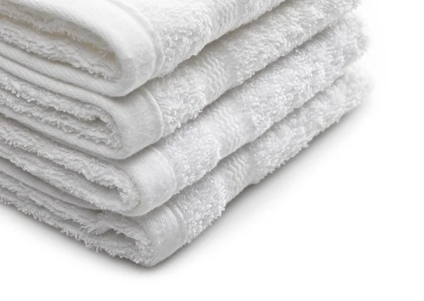 Stack of white hotel towels on a white background — Stock Photo, Image