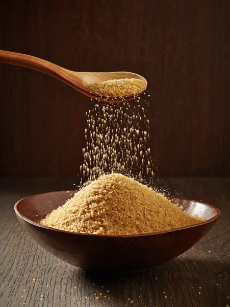 Brown sugar in a bowl — Stock Photo, Image