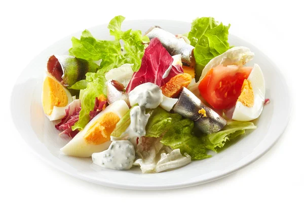 Fresh salad with eggs and anchovies — Stock Photo, Image