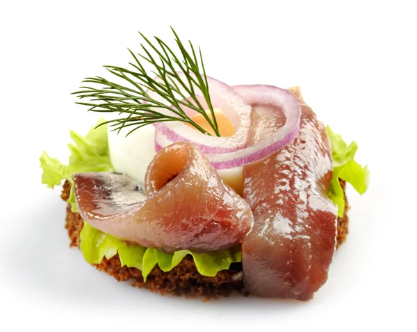 Canape with anchovy and egg — Stock Photo, Image