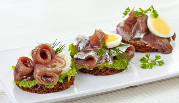 canapes with anchovies and egg