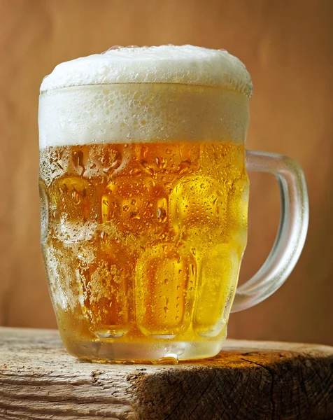 Frosty glass of light beer Royalty Free Stock Images