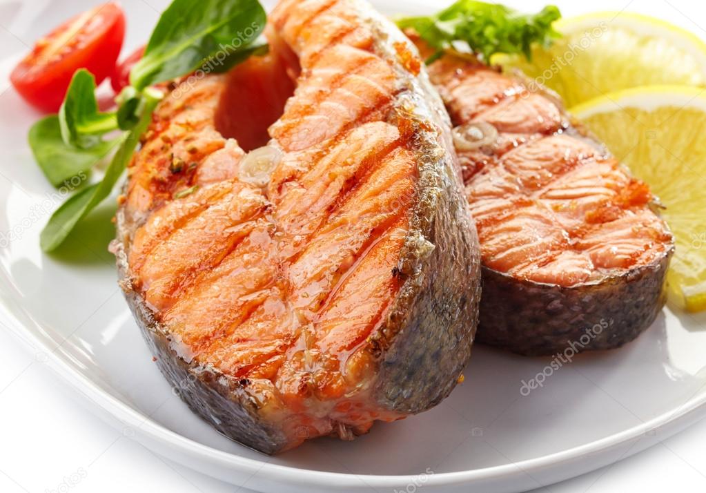 fresh grilled salmon steak slices