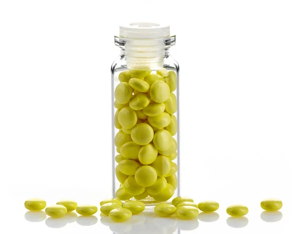 Garrafa de pílulas de extrato de valeriana amarela — Fotografia de Stock