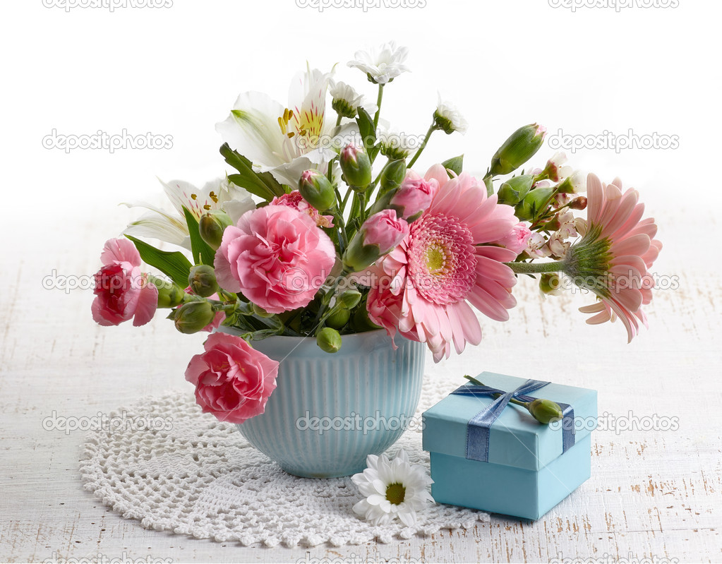 Bouquet of flowers and gift box