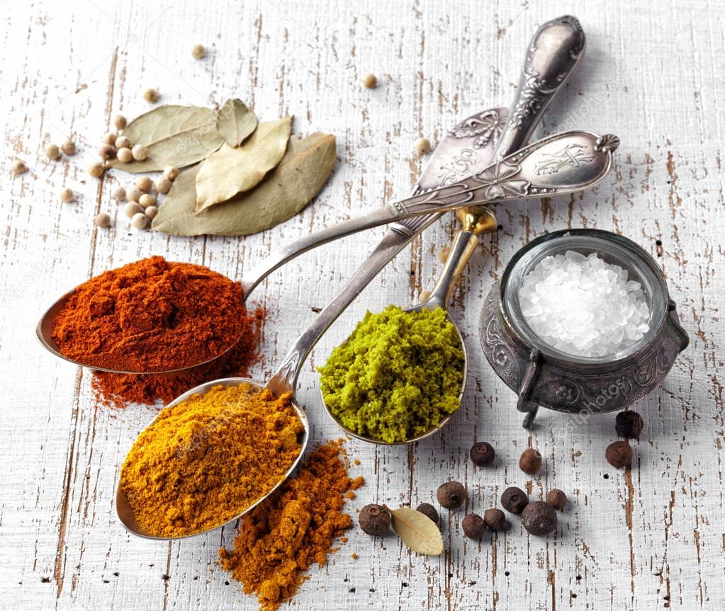 various spices on a white background