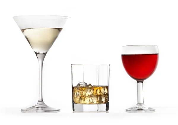 Three glasses of various drinks — Stock Photo, Image