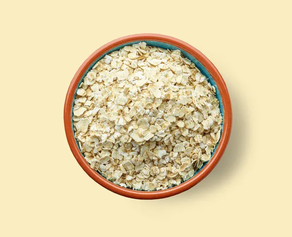 米色背景的燕麦片碗 顶部视图 — 图库照片
