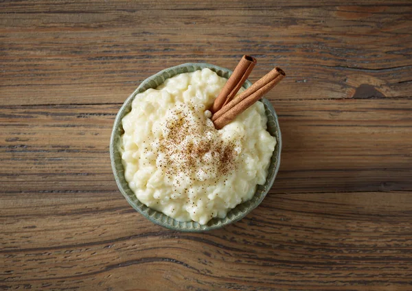 Bowl Rice Milk Pudding Cinnamon Wooden Kitchen Table Top View — Stock Photo, Image