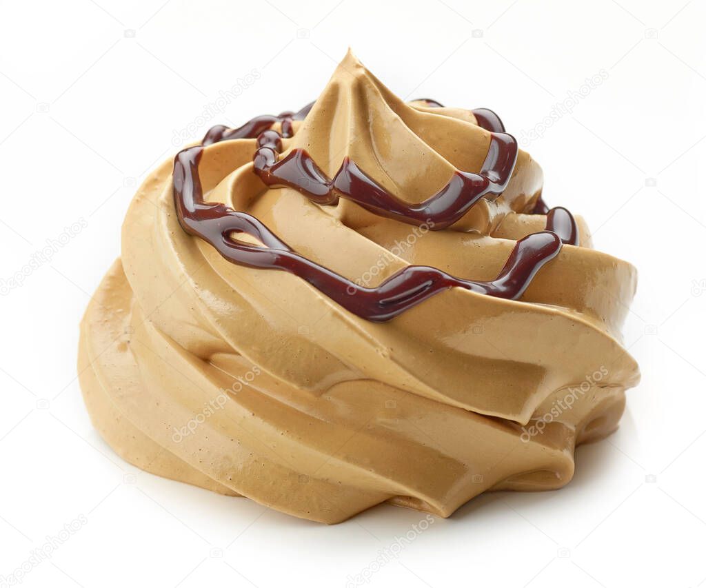 whipped caramel and coffee mousse cream decorated with chocolate sauce isolated on white background
