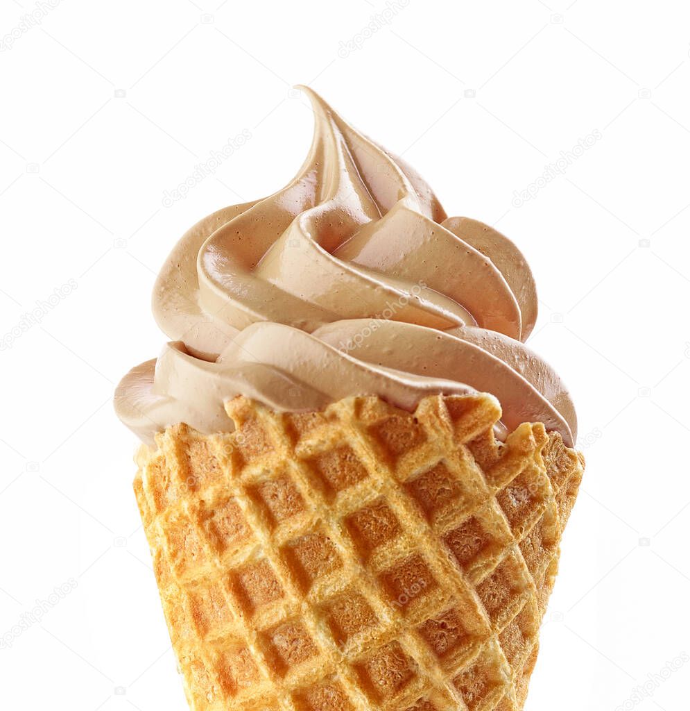 close up of soft ice cream cone isolated on white background