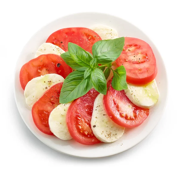 Teller Mit Tomaten Und Mozzarella Mit Basilikum Und Olivenöl Isoliert — Stockfoto