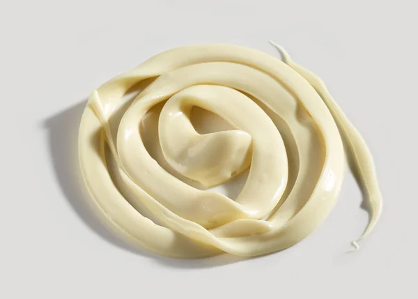 Melted White Chocolate Swirl White Background — Φωτογραφία Αρχείου