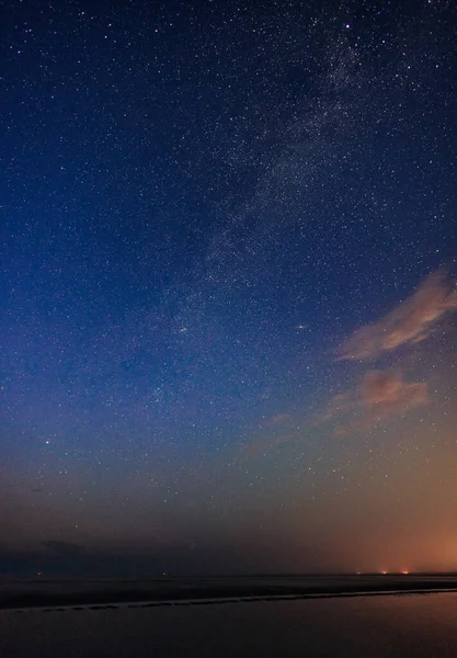 starry sky landscape at night over the sea