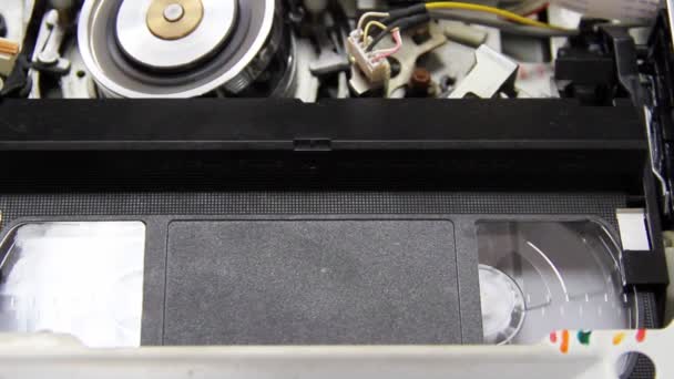 Videotape into the VCR — Stock Video