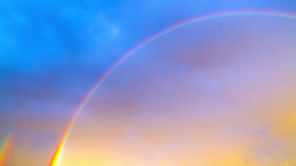 Rainbow on blue sky, time-lapse — Stock Video