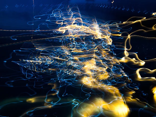 Lights passing over water — Φωτογραφία Αρχείου