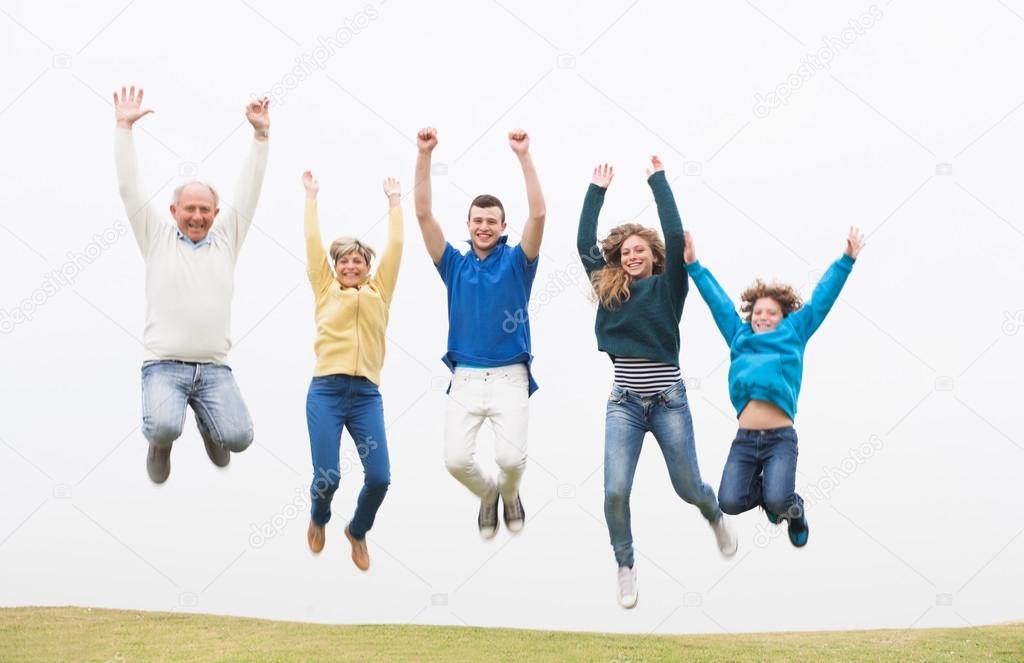 Family jumping on the air at park