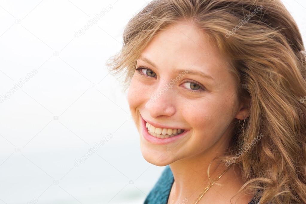 Beautiful smiling woman outdoor portrait