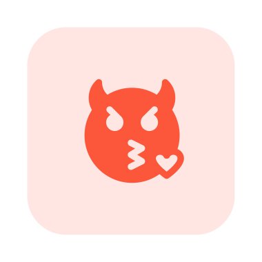 Şeytan surat bir çift boynuzla öpücük yolluyor.