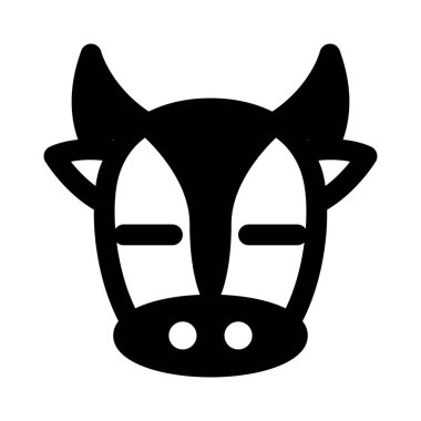 Uzun boynuzları ve gözleri kapalı bir inek.