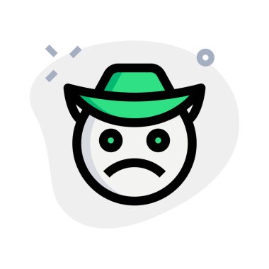 Şapkalı bir kovboyun somurtkan yüzü.