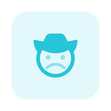 Şapkalı bir kovboyun somurtkan yüzü.