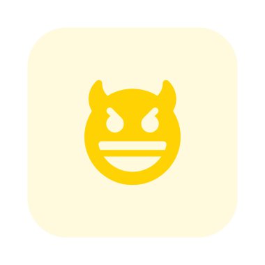 Sırıtan şeytan ve boynuzlar açık ağızla gülümsüyor.