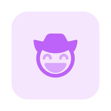 Sırıtan geniş gözlü, şapkalı kovboy.