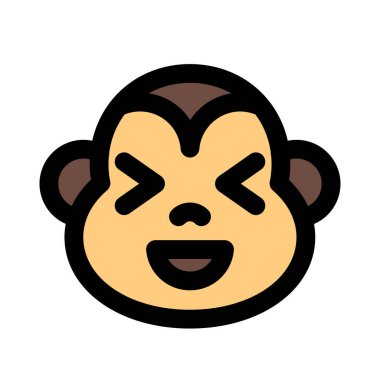 maymun aynı anda sırıtıyor ve şaşı bakıyor.