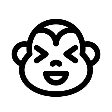 maymun aynı anda sırıtıyor ve şaşı bakıyor.