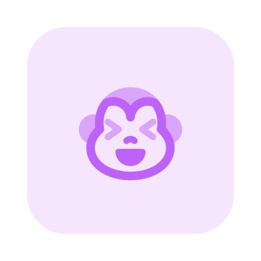 maymun aynı anda sırıtıyor ve şaşı bakıyor.