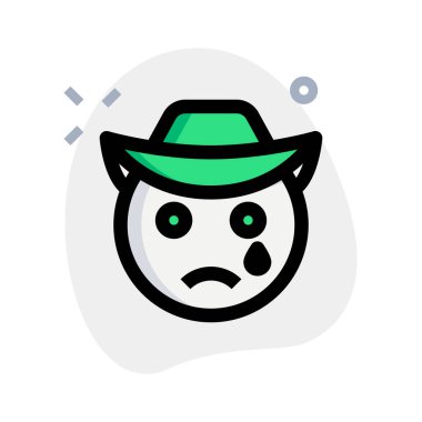 Ağlayan kovboyun yüzünden gözyaşları akıyor.