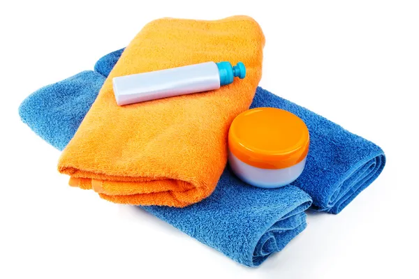 Still-life with bath towel and shampoo on a white — Stock Photo, Image