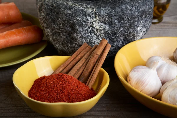 Still-life with a stone mortar and spices — Stock Photo, Image