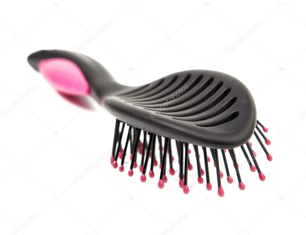 Black female hairbrush isolated on a white background
