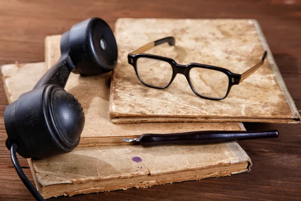 Still-life with old writing-books a nib and phone — Stock Photo, Image