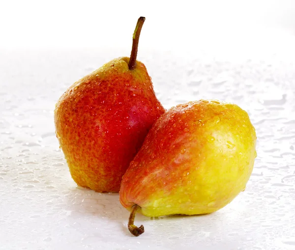 Two yellow-red pears on a white background — Stock Photo, Image
