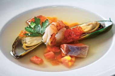 Fish soup with red caviar