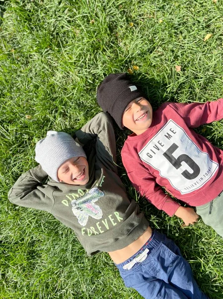 Two Cute Kid Lying Grass Background — Stock Photo, Image