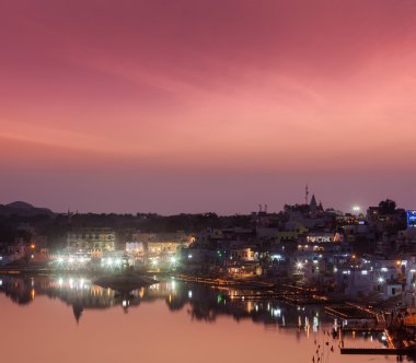 Sacred Puskhar lake and ghats of town Pushkar clipart