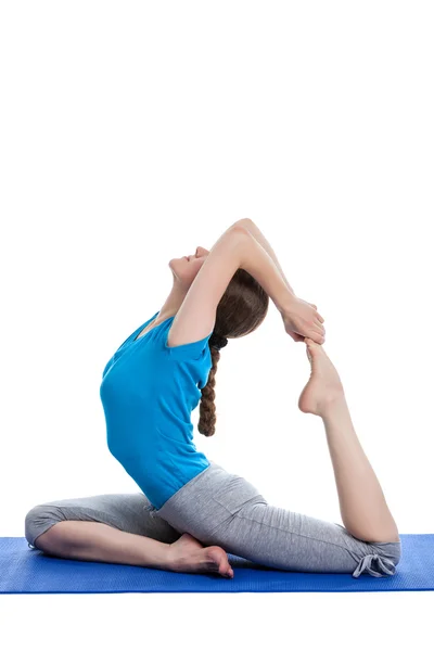 Beautiful woman doing yoga asana excerise — Stock Photo, Image