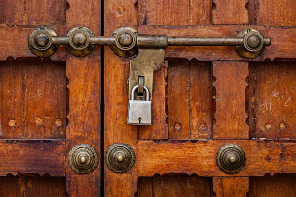 Latch with padlock on door — Stock Photo, Image
