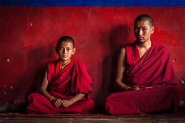 Tibetan Buddhist monks in Diskit monastery. Nubra valley, Ladakh clipart