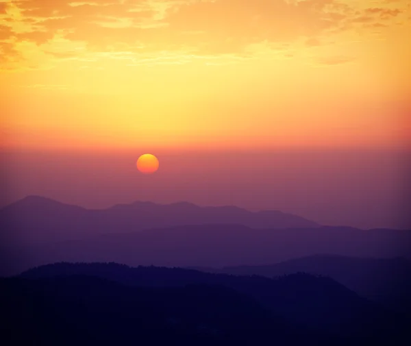 Sunset in hills — Stock Photo, Image