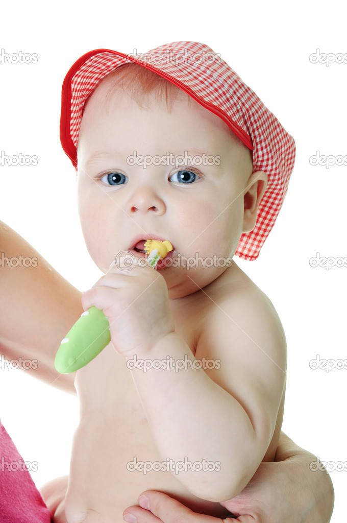 Little baby girl with teething brush