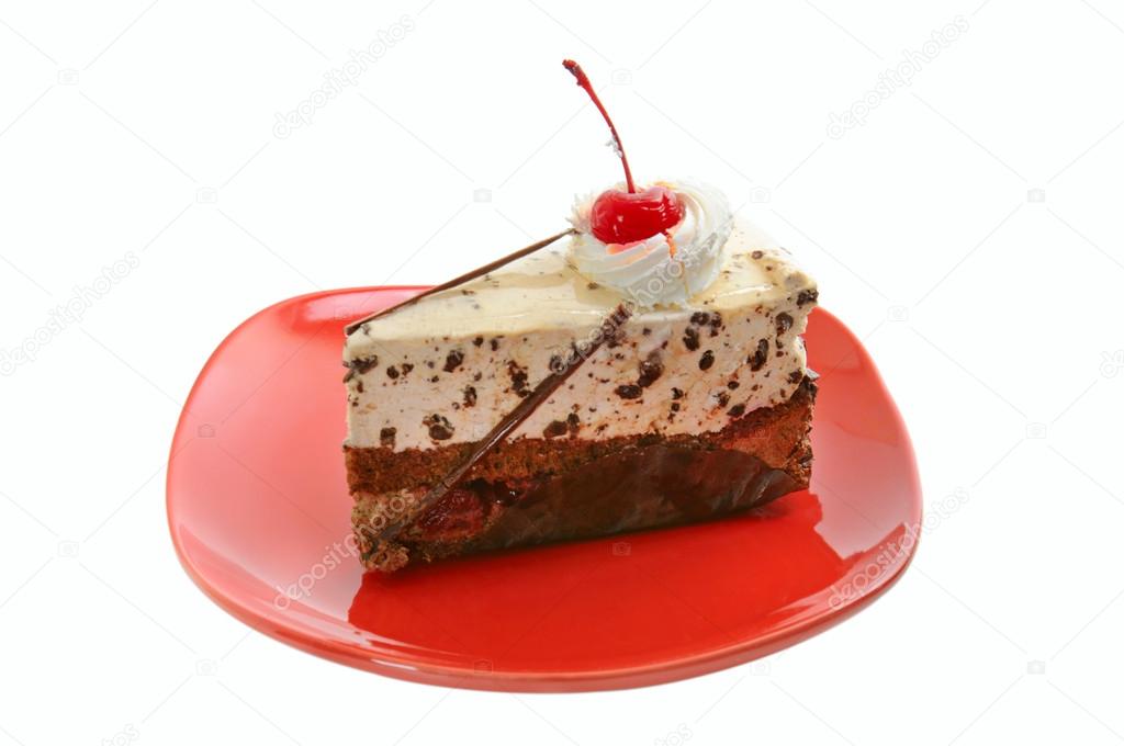 Chocolate cake on red dish