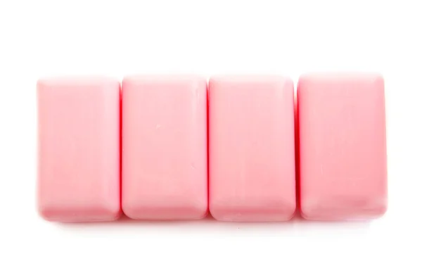 Négy rózsaszín szappan bárok — Stock Fotó