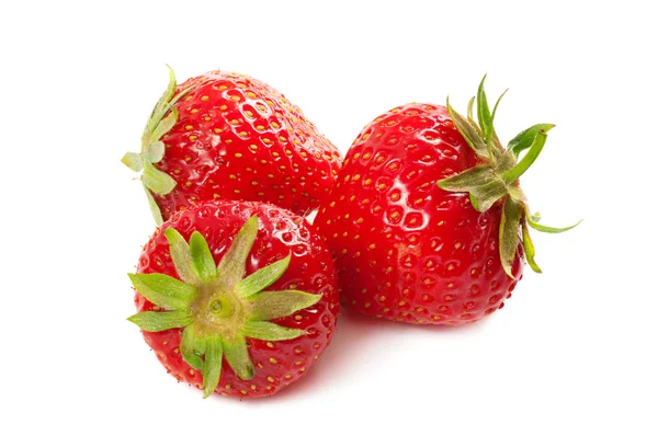 Tres fresas aisladas sobre un blanco —  Fotos de Stock